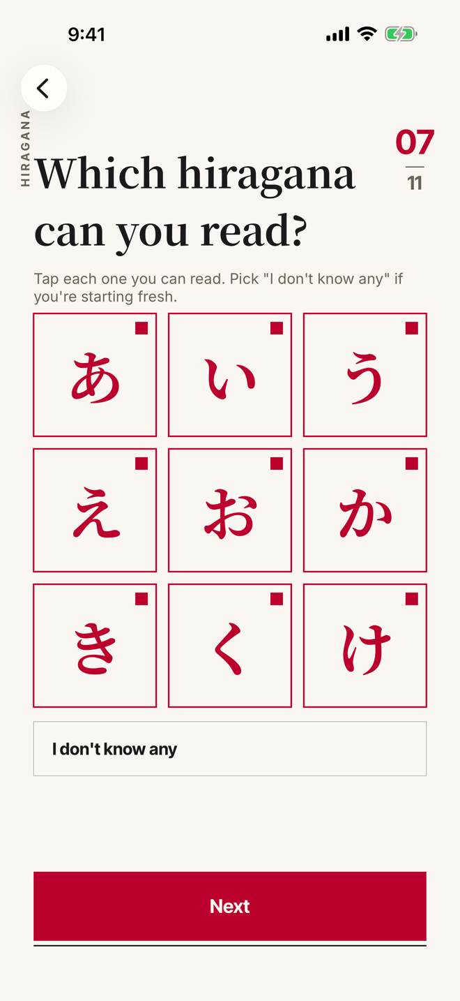The onboarding hiragana chart with several characters already ticked.